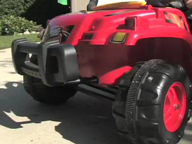 Mighty Wheelz 12V Vehicle Red / Yellow / Black  - image 1 from the video